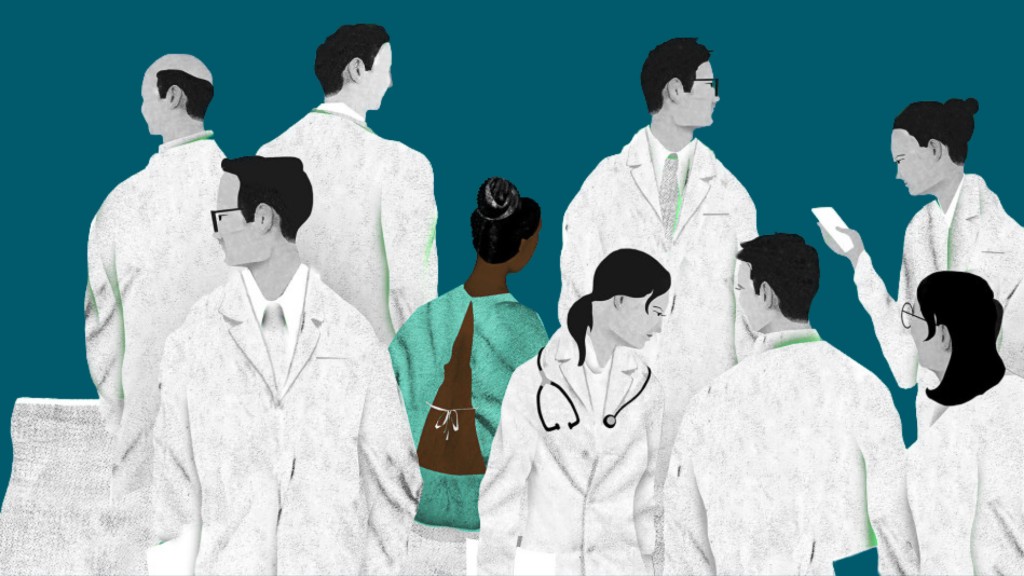 A group of clinicians seen from behind or in profile against a teal background. Most wear white coats; one person, with darker skin, wears teal scrubs.
