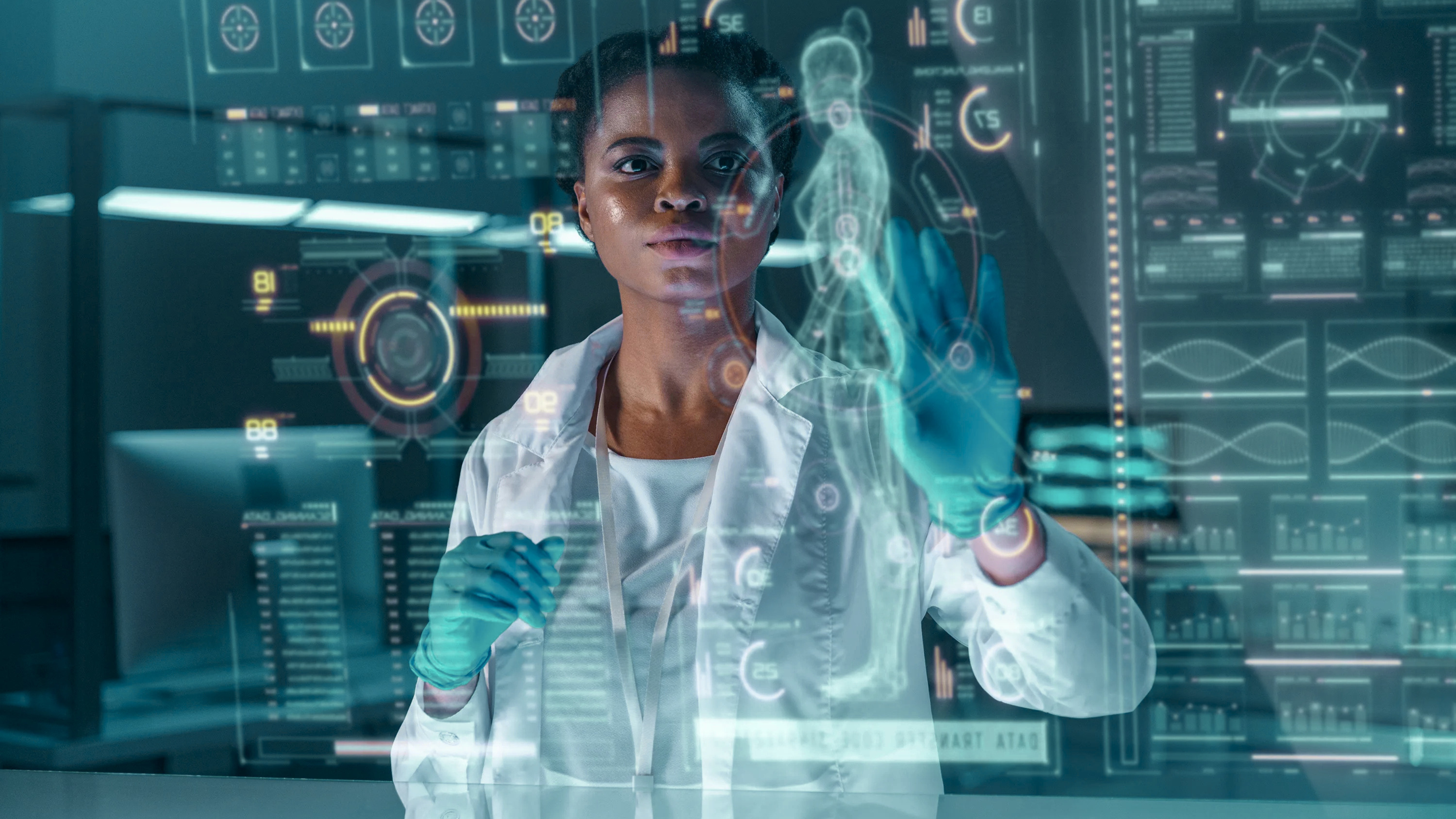 A clinician in a white coat and blue gloves interacts with a holographic medical display of a human figure.